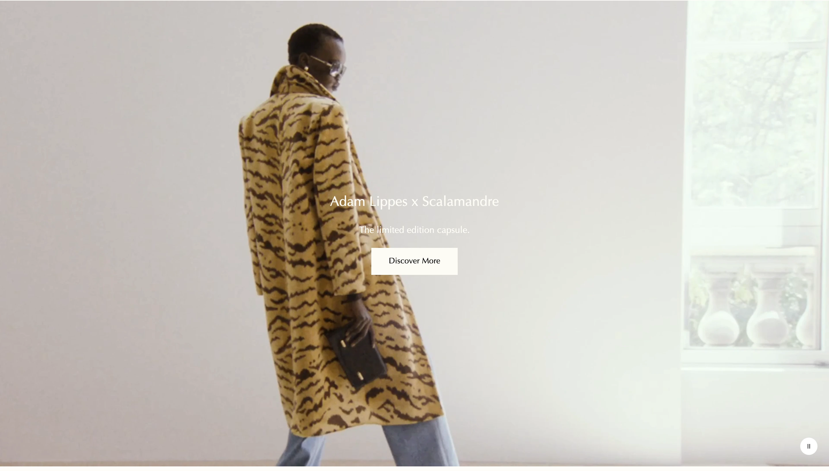A high-fashion, serene cinematic video section with delicate typography floating over an editorial runway moment.