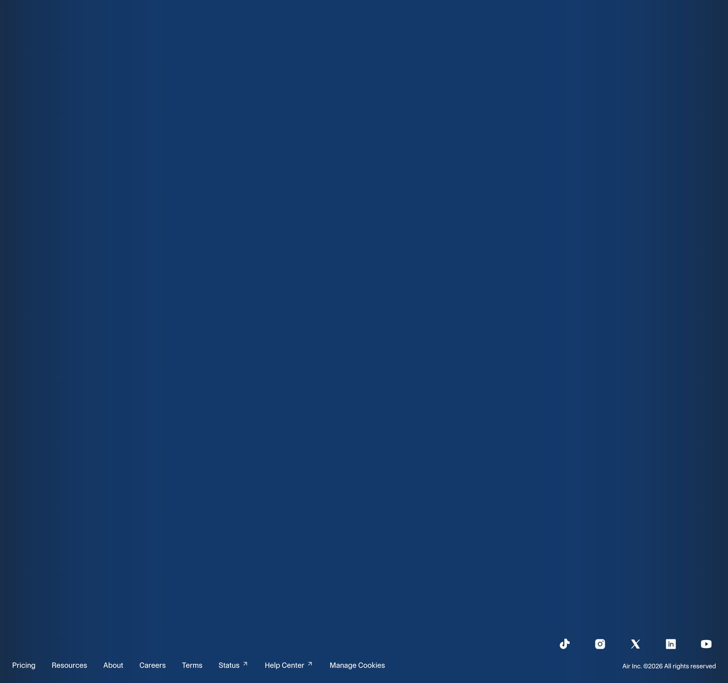 An expansive deep navy footer leaving vast quiet space above a subtle bottom bar of navigation links and social icons.