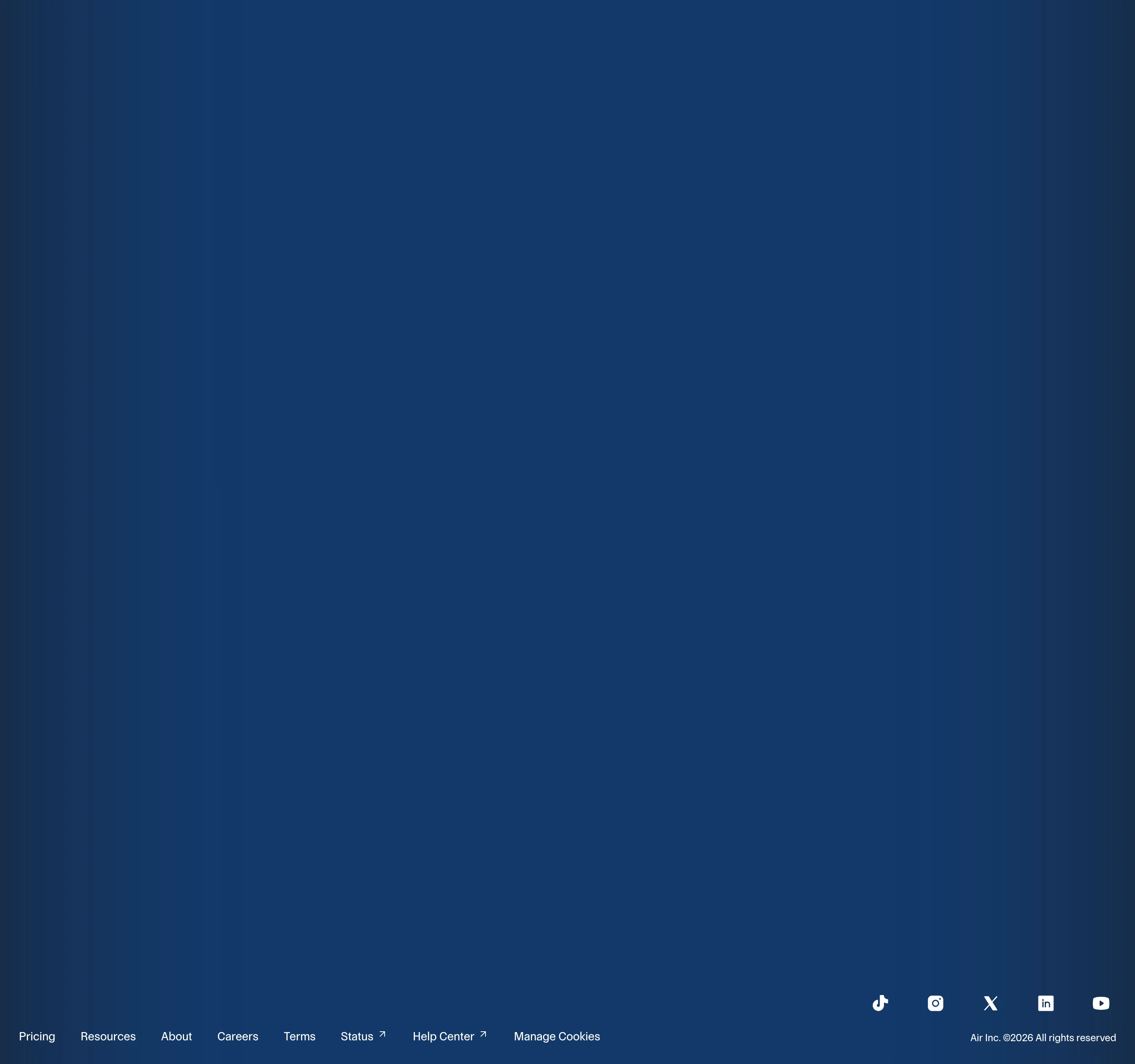 An expansive deep navy footer leaving vast quiet space above a subtle bottom bar of navigation links and social icons.