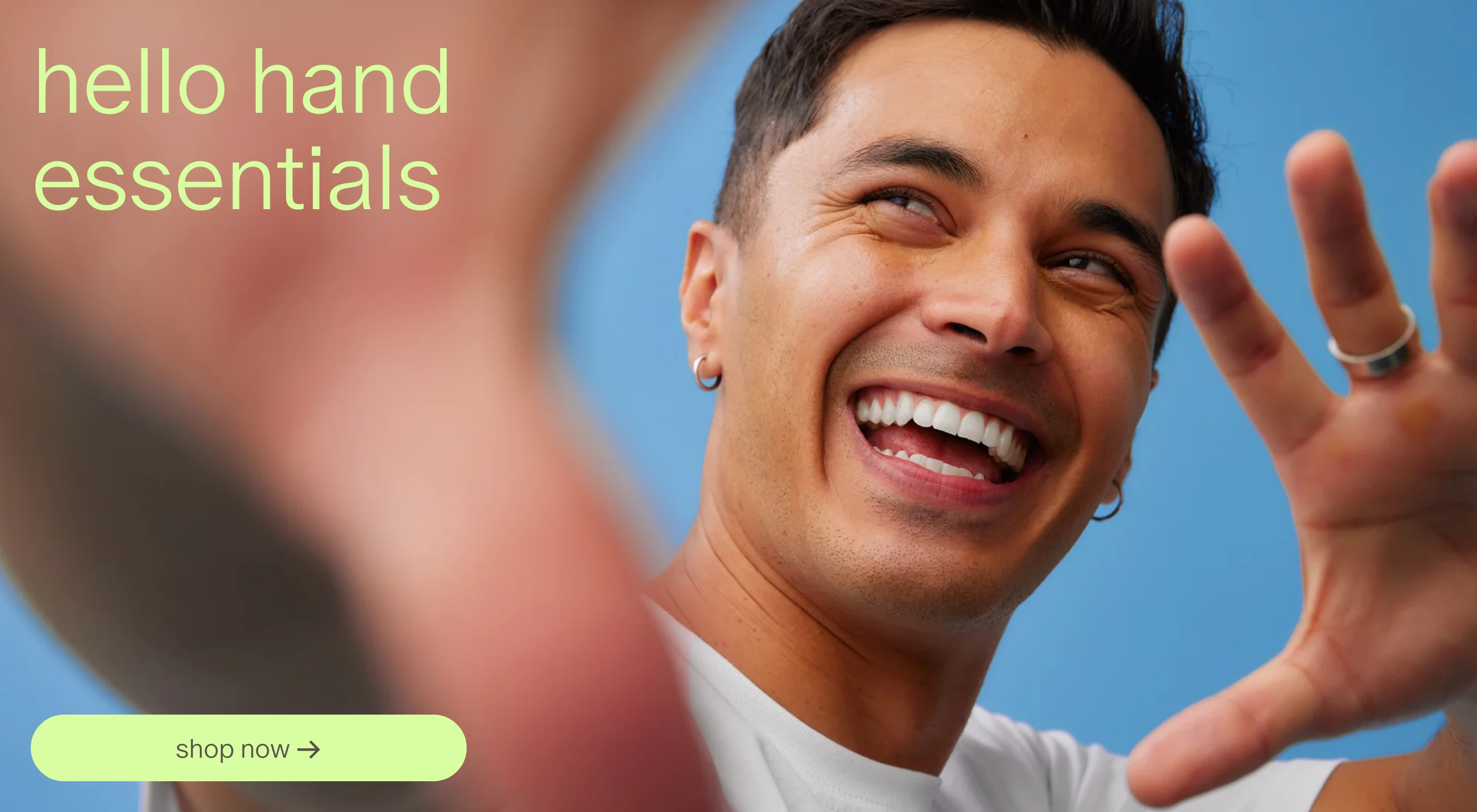 Joyful full-bleed lifestyle banner featuring expressive photography framed by all-lowercase lime green typography and a matching pill button.