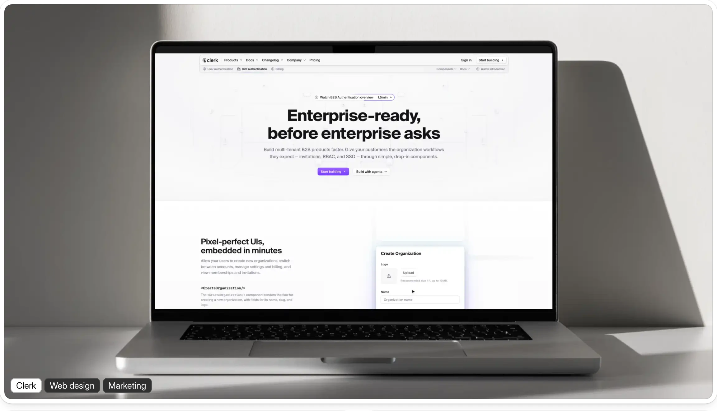 Crisp studio presentation of a SaaS landing page framed on a modern laptop with soft directional shadows.
