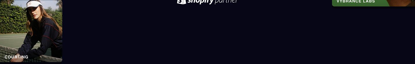 A dark, restrained transitional strip flanking a central partner badge with minimal photography preview cards.