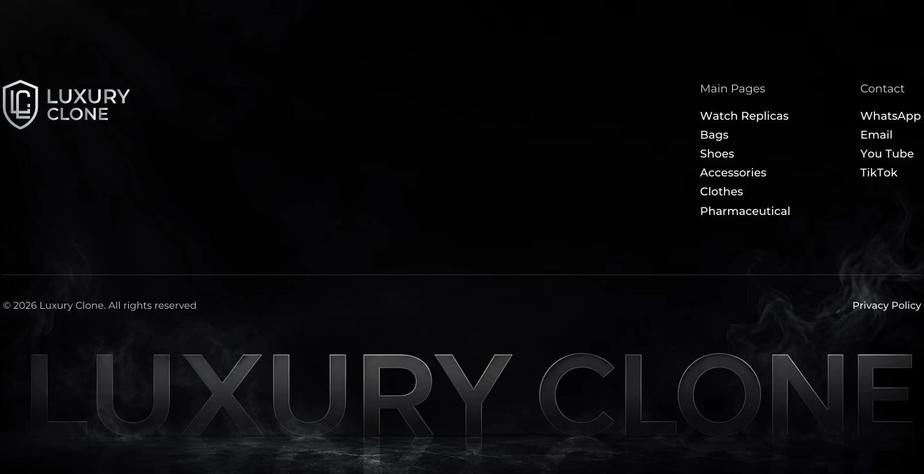 Moody all-black footer featuring smoky atmospheric backdrop, crisp navigation columns, and massive low-opacity ghosted branding spanning the bottom.