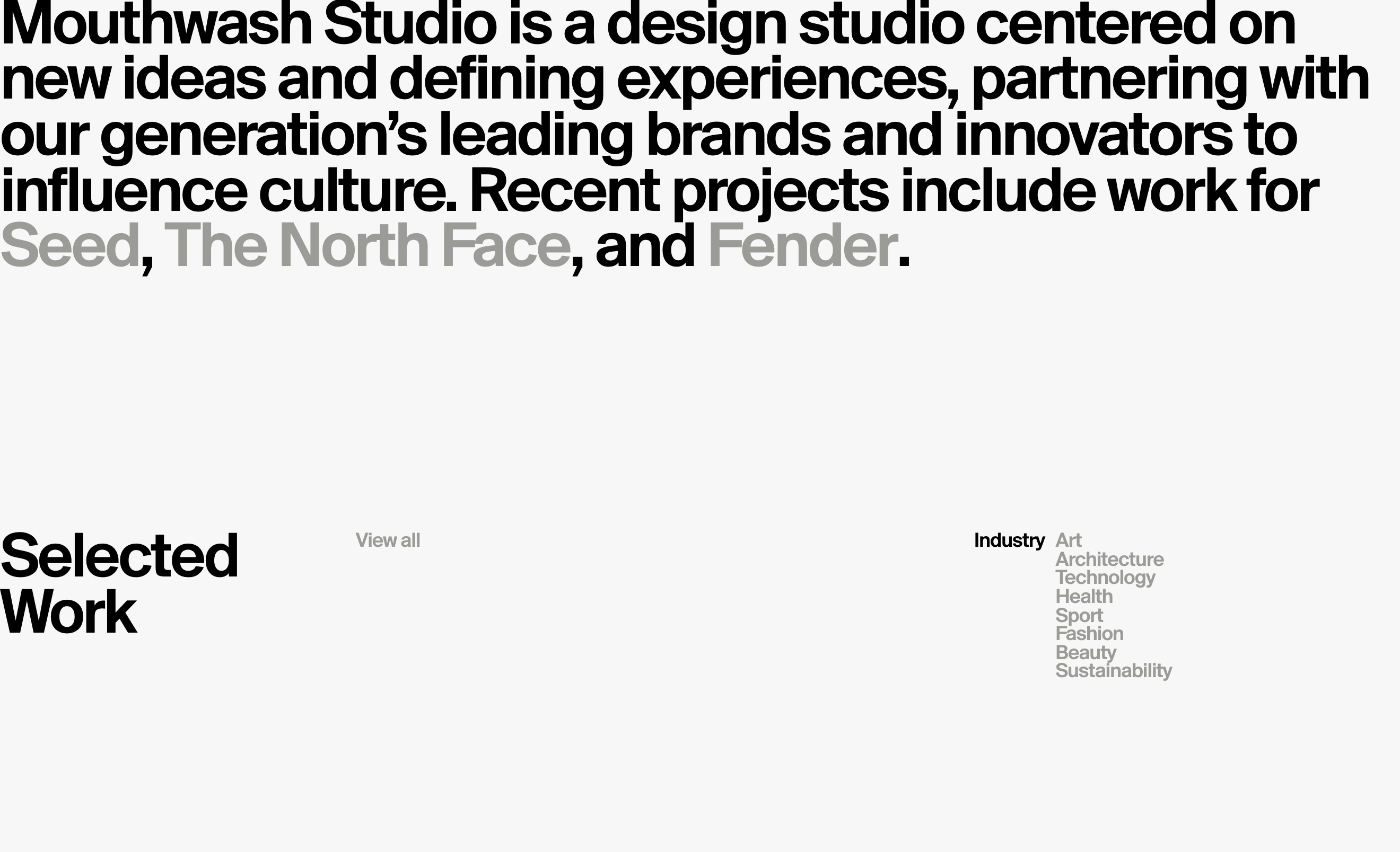 An austere, typography-driven studio intro dominated by massive, tightly-set Swiss sans-serif type over expansive pale grey space.
