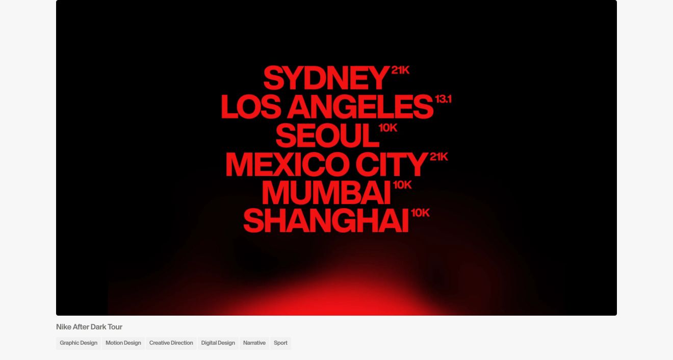 Minimalist portfolio showcase featuring a high-contrast red typographic video card anchored by quiet metadata tags on a light neutral canvas.