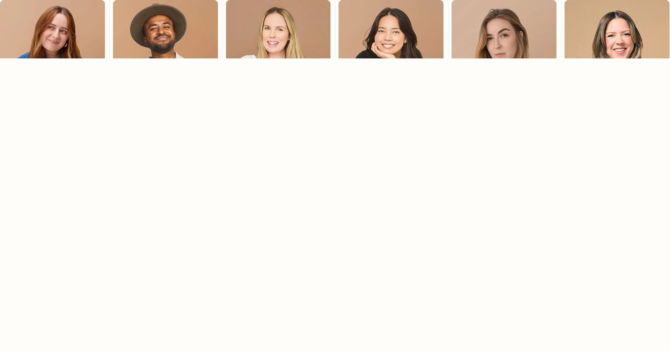 A warm, friendly row of rounded team portraits resting quietly atop an expansive cream background.