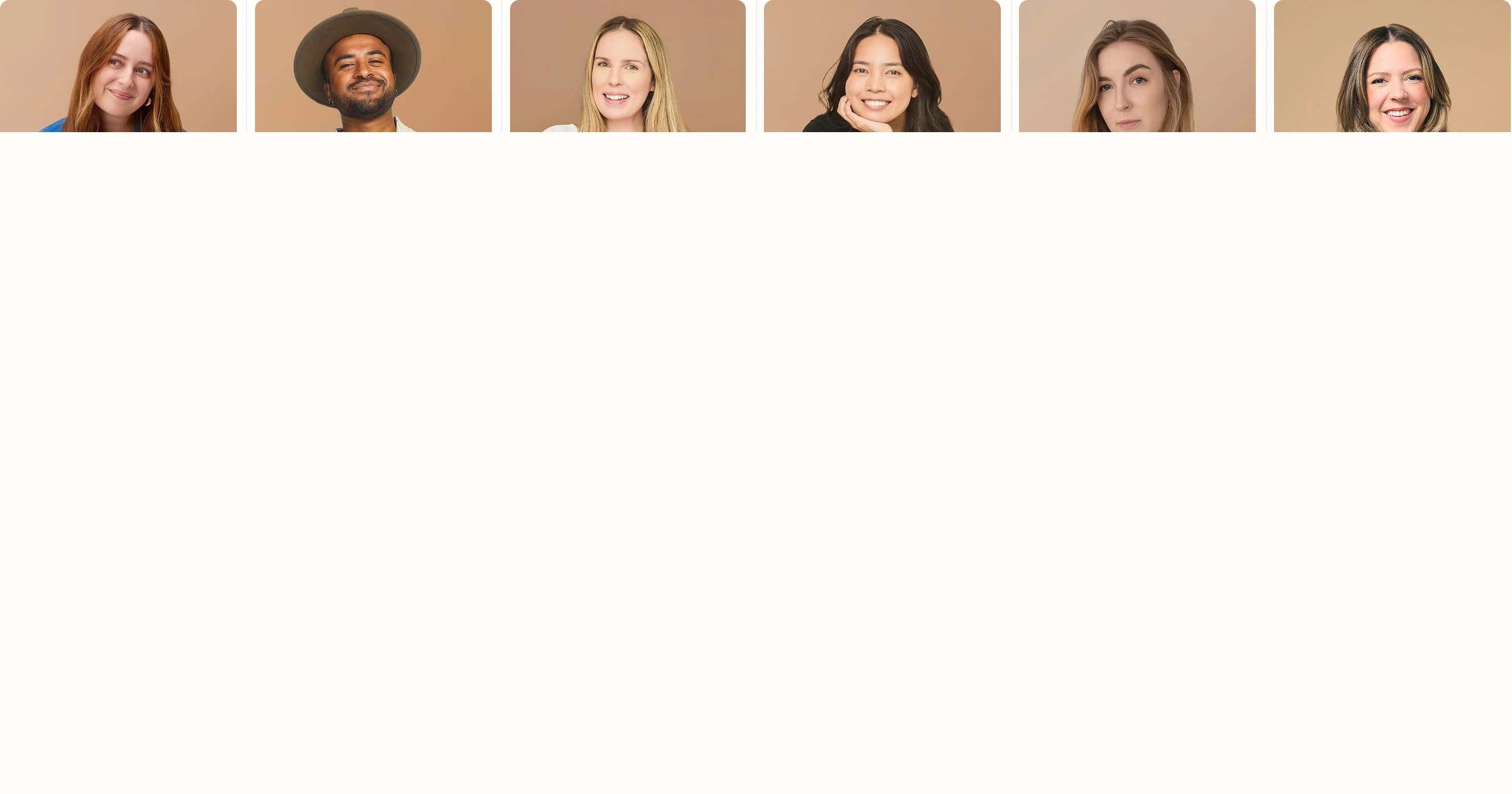 A warm, friendly row of rounded team portraits resting quietly atop an expansive cream background.
