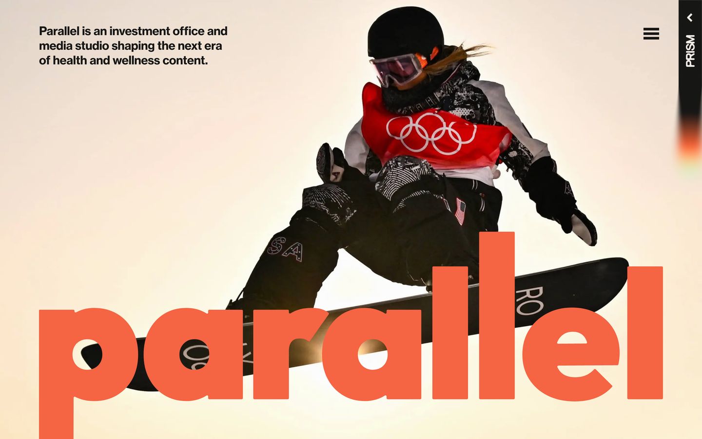 A dynamic action photograph intersects with massive warm coral lettering to create an energetic, magazine-style hero.