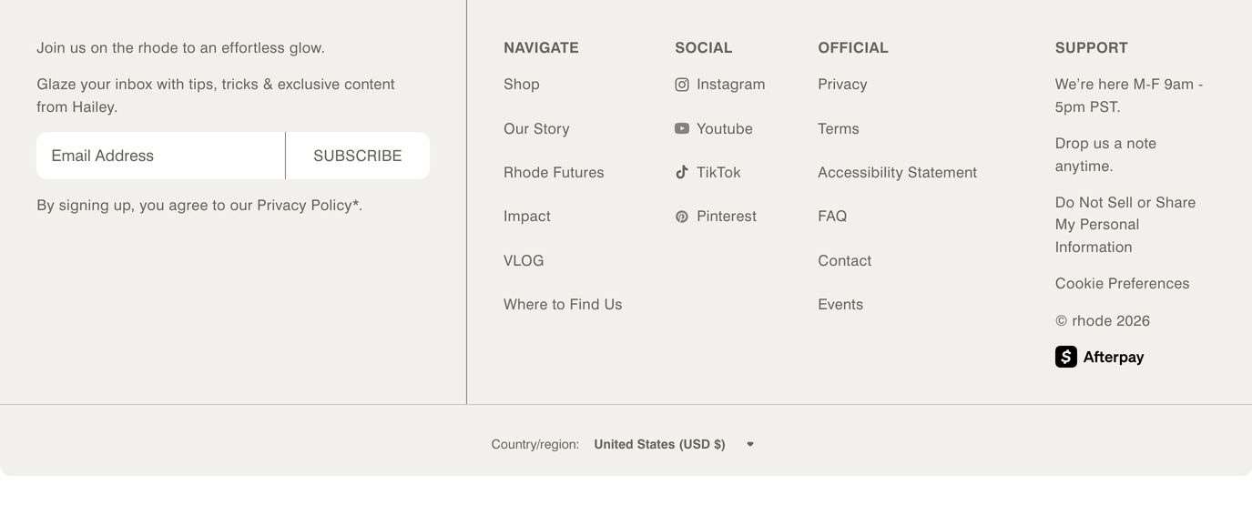 Soft, muted e-commerce footer structured with a delicate divider separating newsletter signup from minimalist navigation columns.