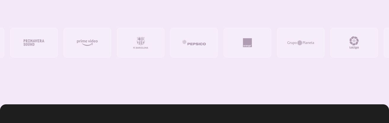 A quiet row of muted client logos set inside soft rounded tiles over a pale lilac background.