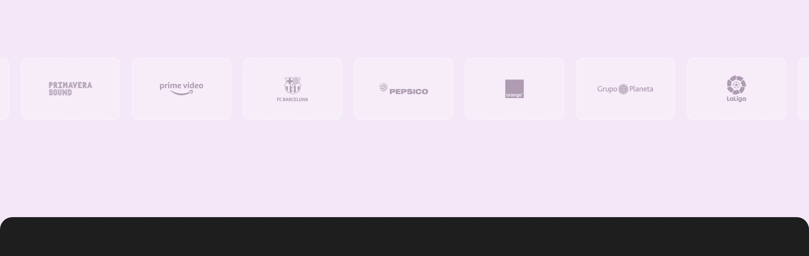 A quiet row of muted client logos set inside soft rounded tiles over a pale lilac background.