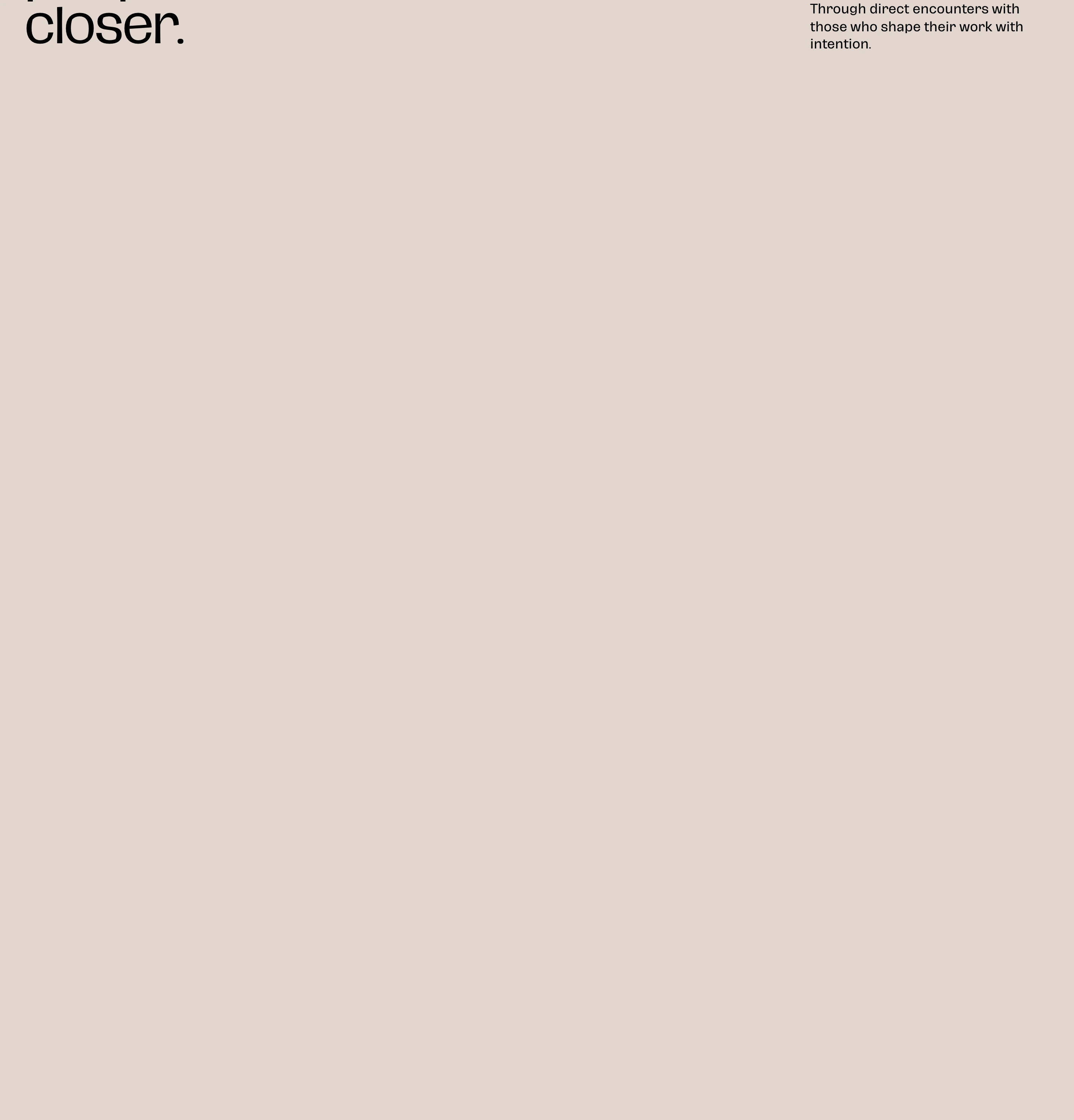 Vast, warm minimal void punctuated only by subtle editorial text in opposing top corners.