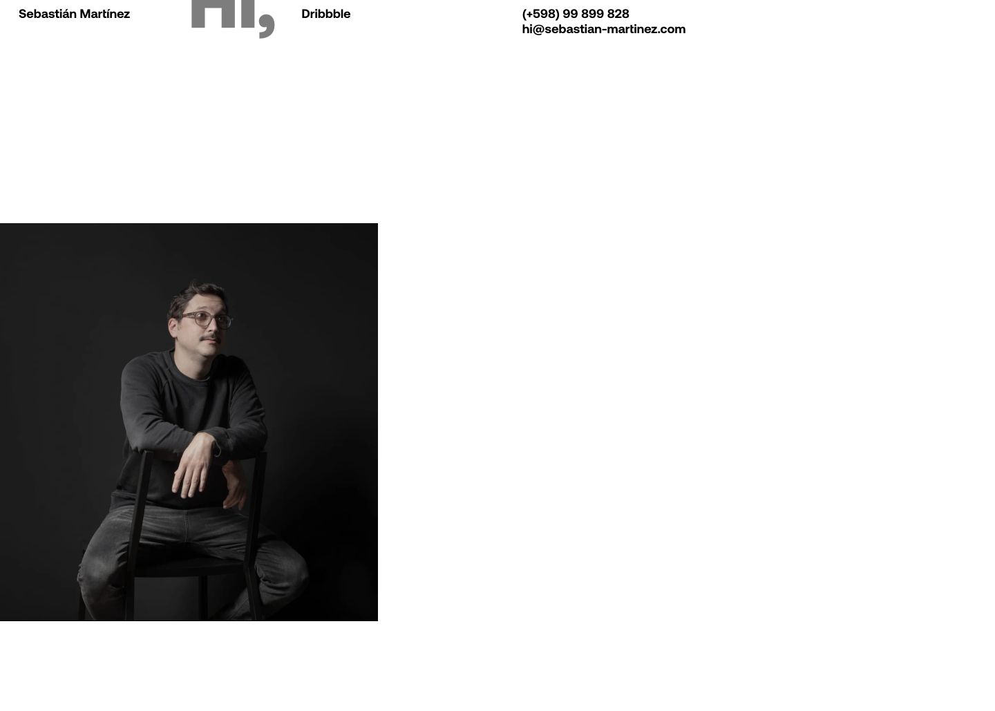 Vast white negative space frames an understated seated portrait with minimal header navigation and contact details.