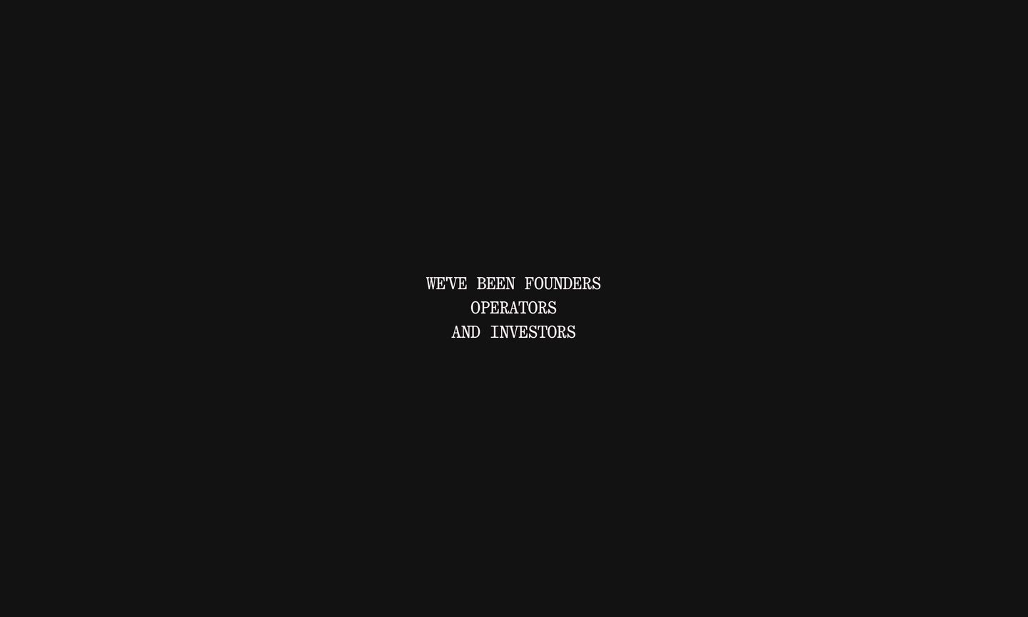An austere, dark canvas dominated by vast negative space with a tiny, centered monospaced statement.