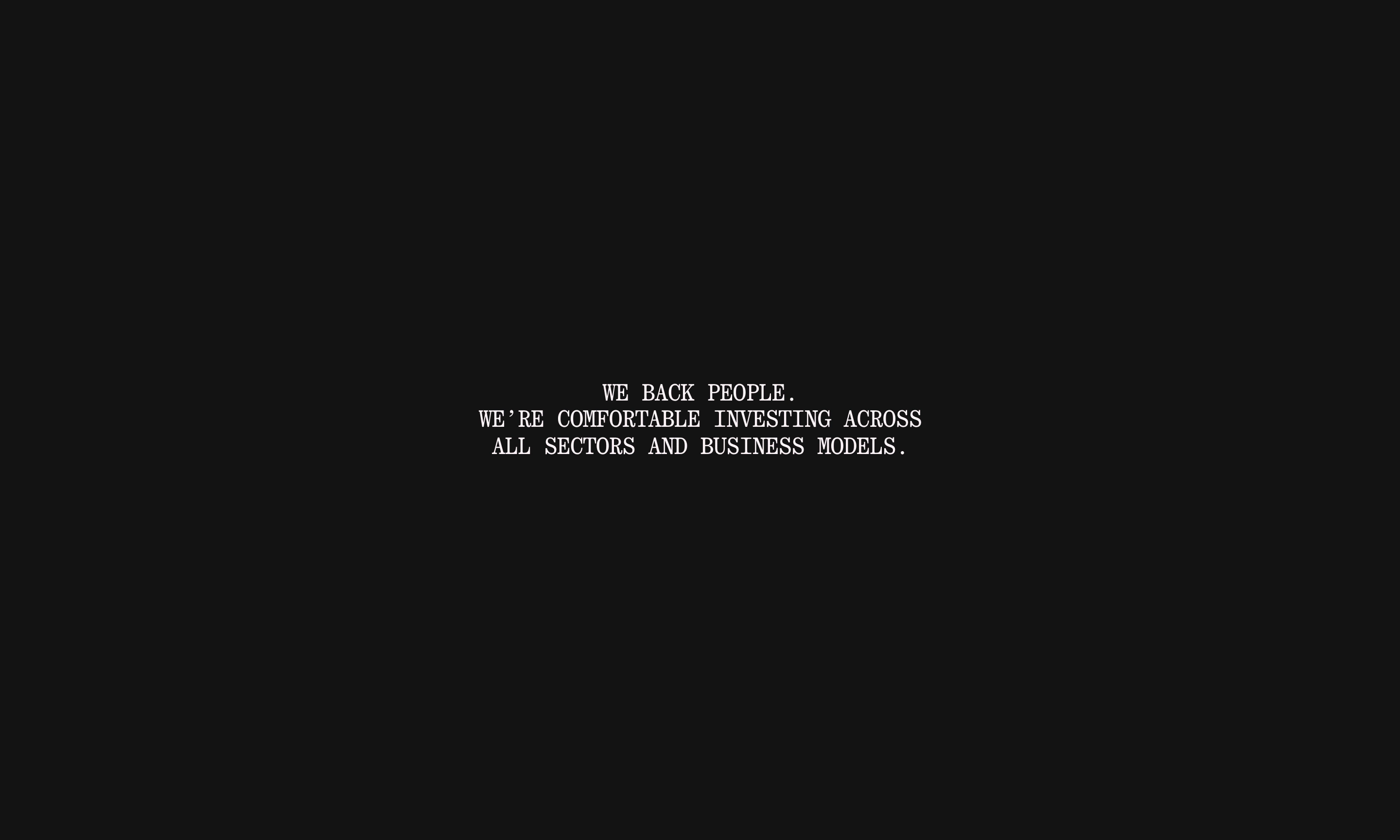 A vast black void holding a quiet, centered monospace manifesto with radical negative space.