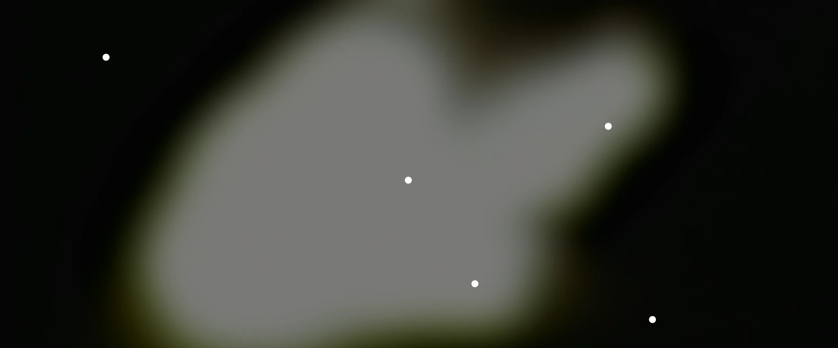 An eerie, luminous constellation of points floats across an amorphous hazy light bloom against deep black.