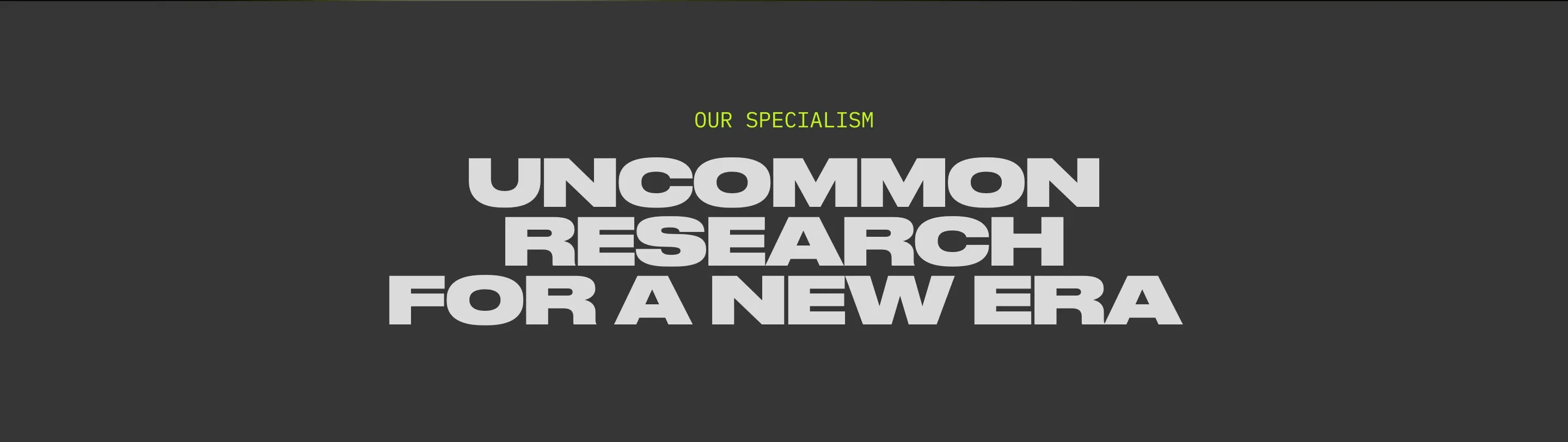 Heavy extended typography on dark charcoal delivers a blunt, confident typographic section divider.