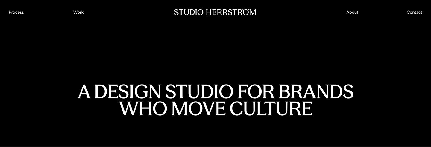 Austere, pitch-black studio hero punctuated solely by an expansive, elegant uppercase statement and minimal corner navigation.