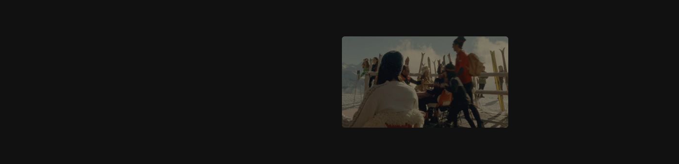 A quiet, atmospheric showcase with a solitary vintage ski photograph suspended in an expansive dark void.