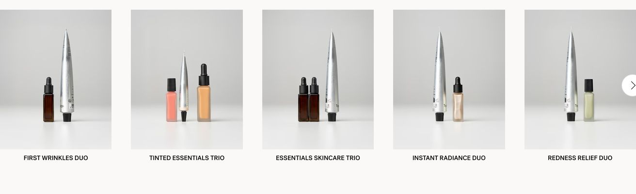 A quiet, clinical product carousel displaying minimalist skincare sets against soft neutral studio backdrops.