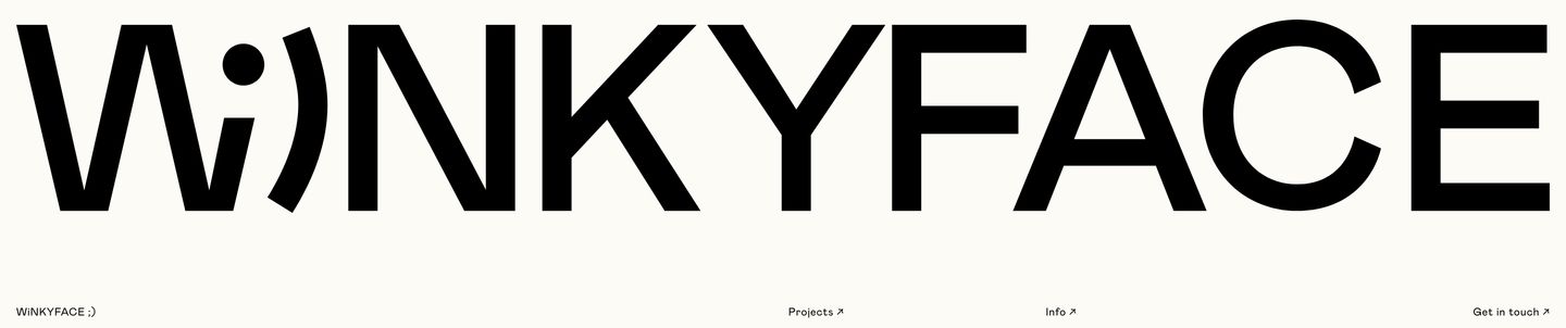 A massive playful typographic wordmark spans across a warm off-white header anchored by sparse minimal navigation links.
