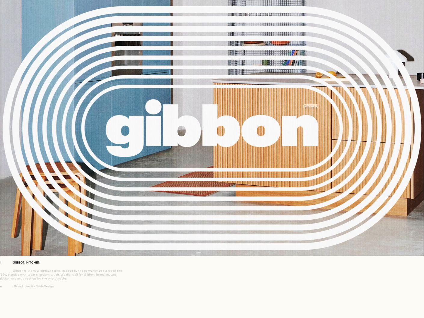 Retro-modern case study showcase featuring an oversized concentric racetrack logo overlaid on interior photography with quiet catalog captions below.